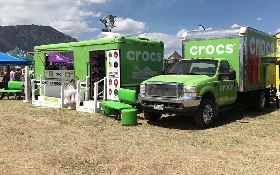 Crocs pop up truck and trailer in the mountains at an event