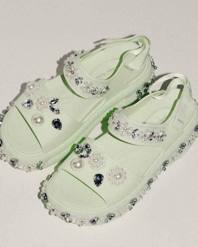 Simone Rocha x Crocs clogs adorned with Jibbitz in the Jade colorway