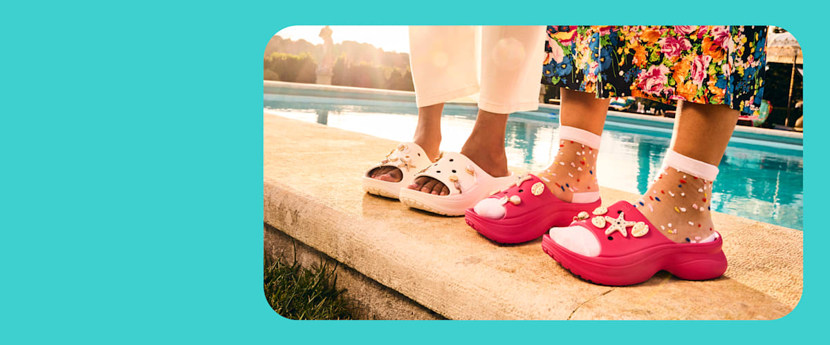 People wearing Crocs by the pool