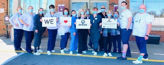 Healthcare Workers posing with their Crocs