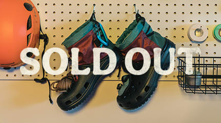 Sold Out, Nicole McLaughlin X Crocs with compass, headlamp, pocket and rope.
