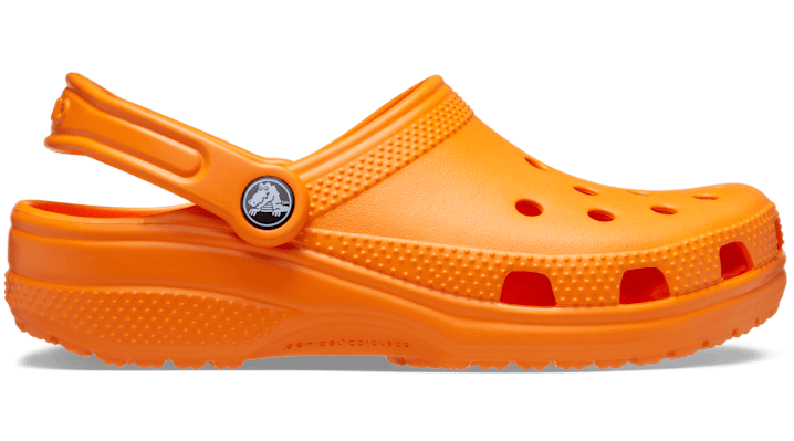 Shop Crocs Classic Clog In Orange Zing