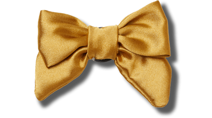 Shop Jibbitz Gold Bow