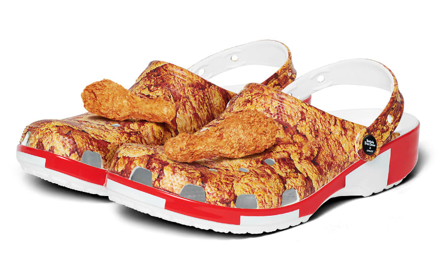 Kentucky Fried Chicken® Classic Clogs featuring drumstick Jibbitz™ on top.