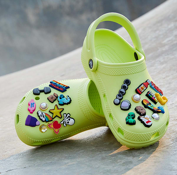 Crocs with charms on on sale them