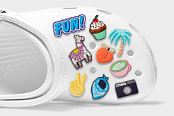 Classic Clog in White with assorted Jibbitz™.