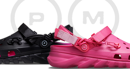 Post Malone X Crocs Clogs in Schwarz und Pink.