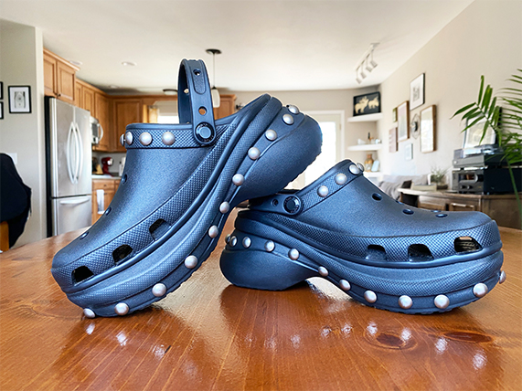 Navy Bae clog with white studs.