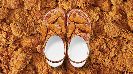 Kentucky Fried Chicken® Classic Clogs featuring drumstick Jibbitz™ on top.