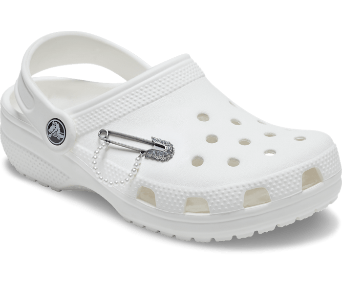 White crocs with pins hotsell