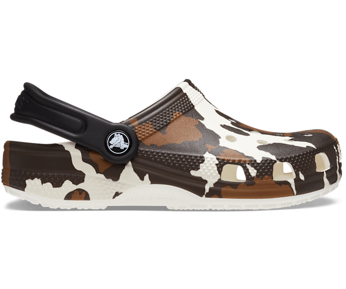 Cow print crocs sales