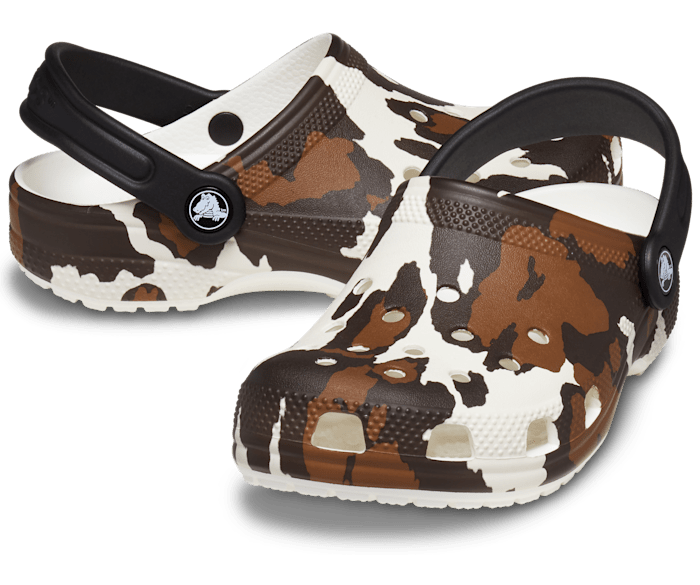Cow print crocs discount