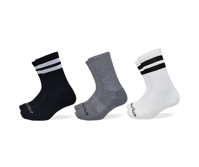 Black crocs with white stripe discount