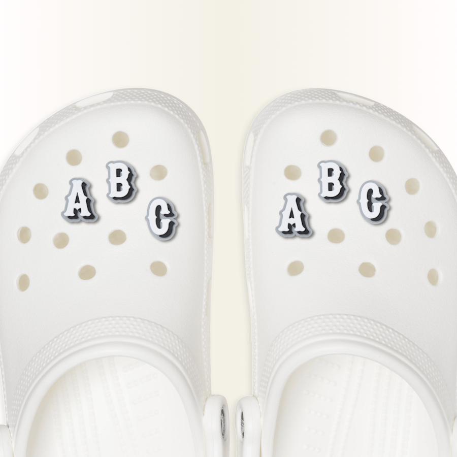 Varsity II style charms, Letters A, B and C displayed on a classic clog.