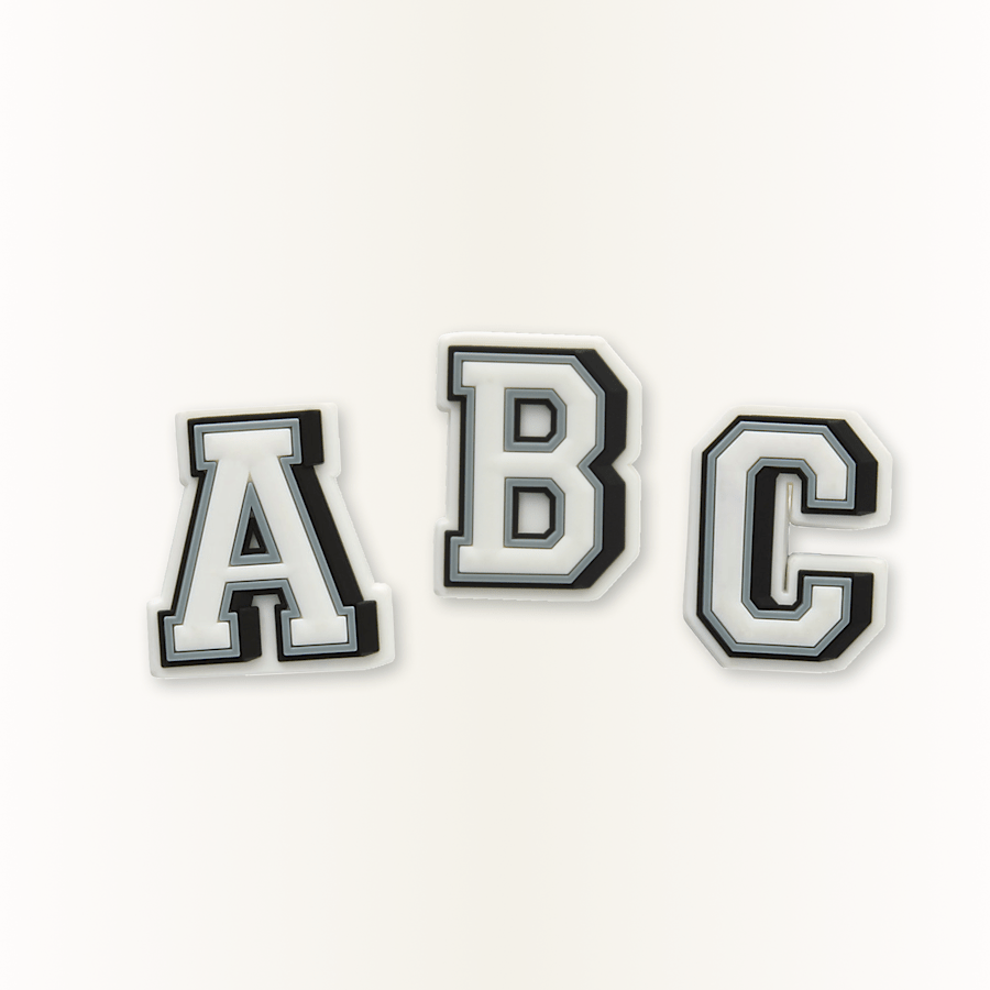 Varsity or collegiate style jibbitz charms. Letters A, B, C.